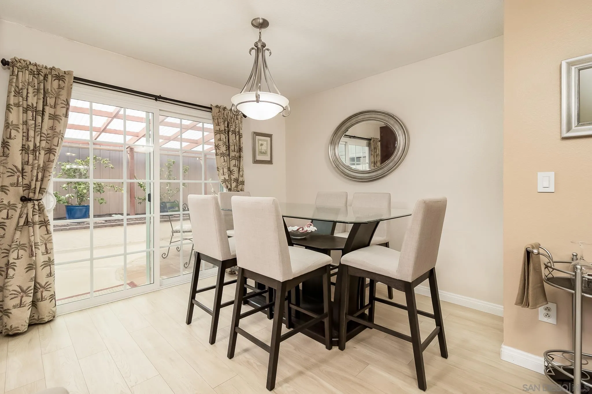 8537 Cordial Road El Cajon, CA 92021 - Photo 7 of 37 a view of a dining room with furniture window and outside view