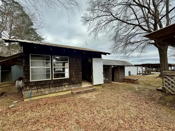 a house with trees in the background