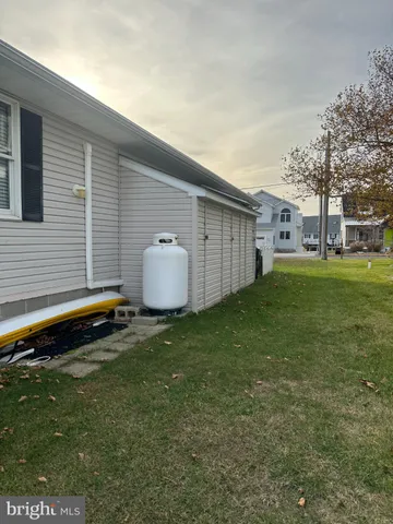 a view of a lake with a sitting area