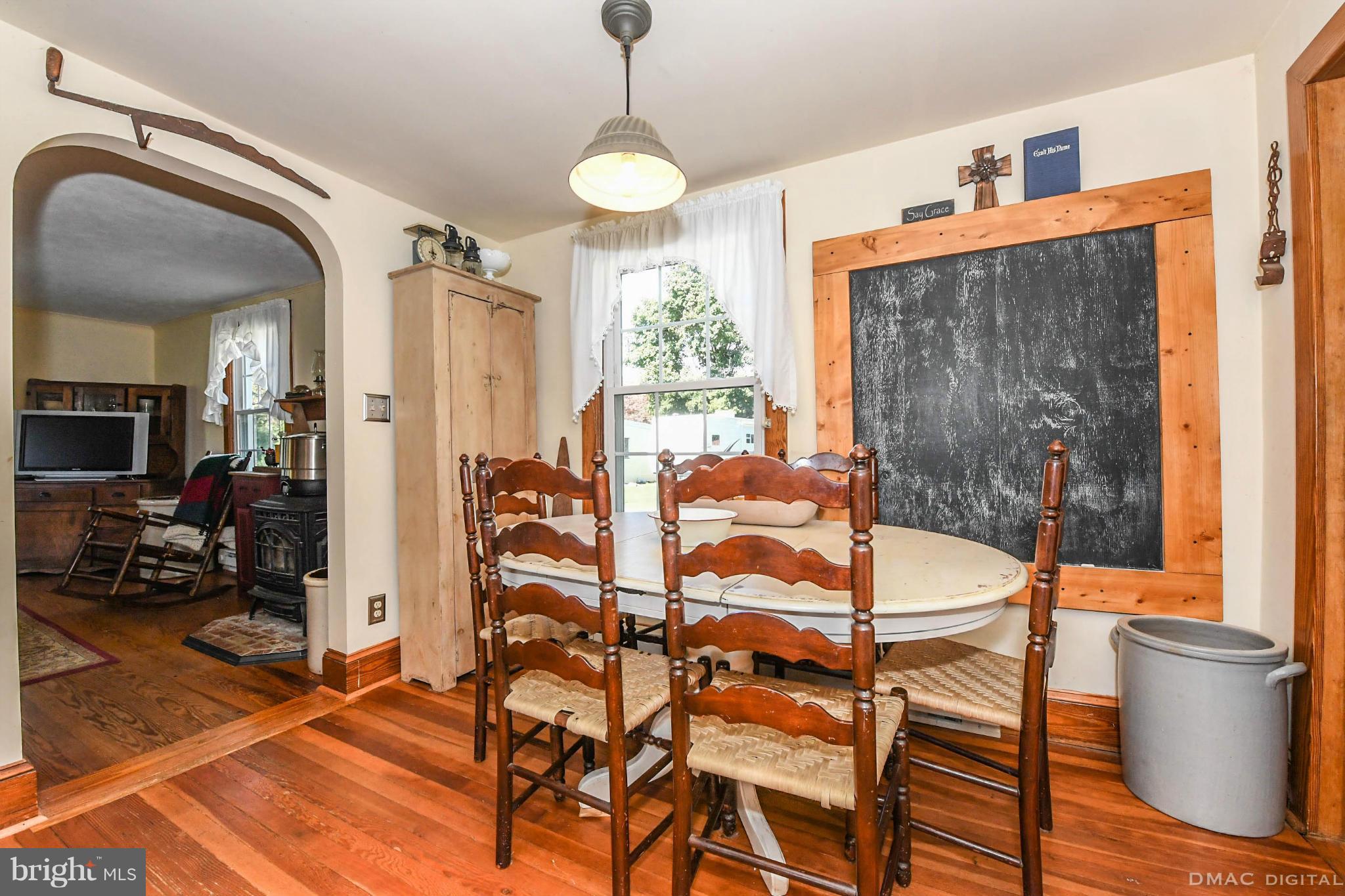 8701 Yellow Springs Road, Unit C Frederick, MD 21702 - Photo 11 of 30 a view of a dining room with furniture window and outside view