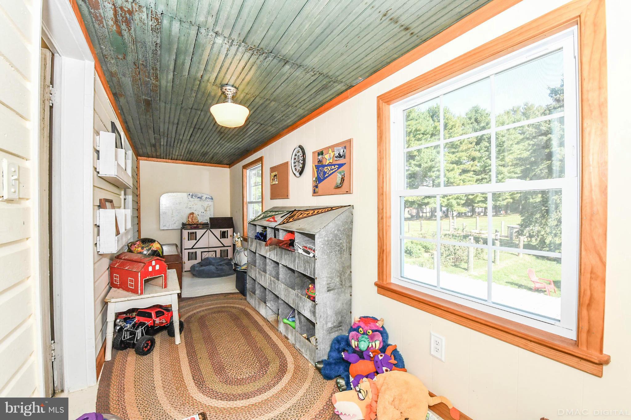 8701 Yellow Springs Road, Unit C Frederick, MD 21702 - Photo 17 of 30 a play room with toys
