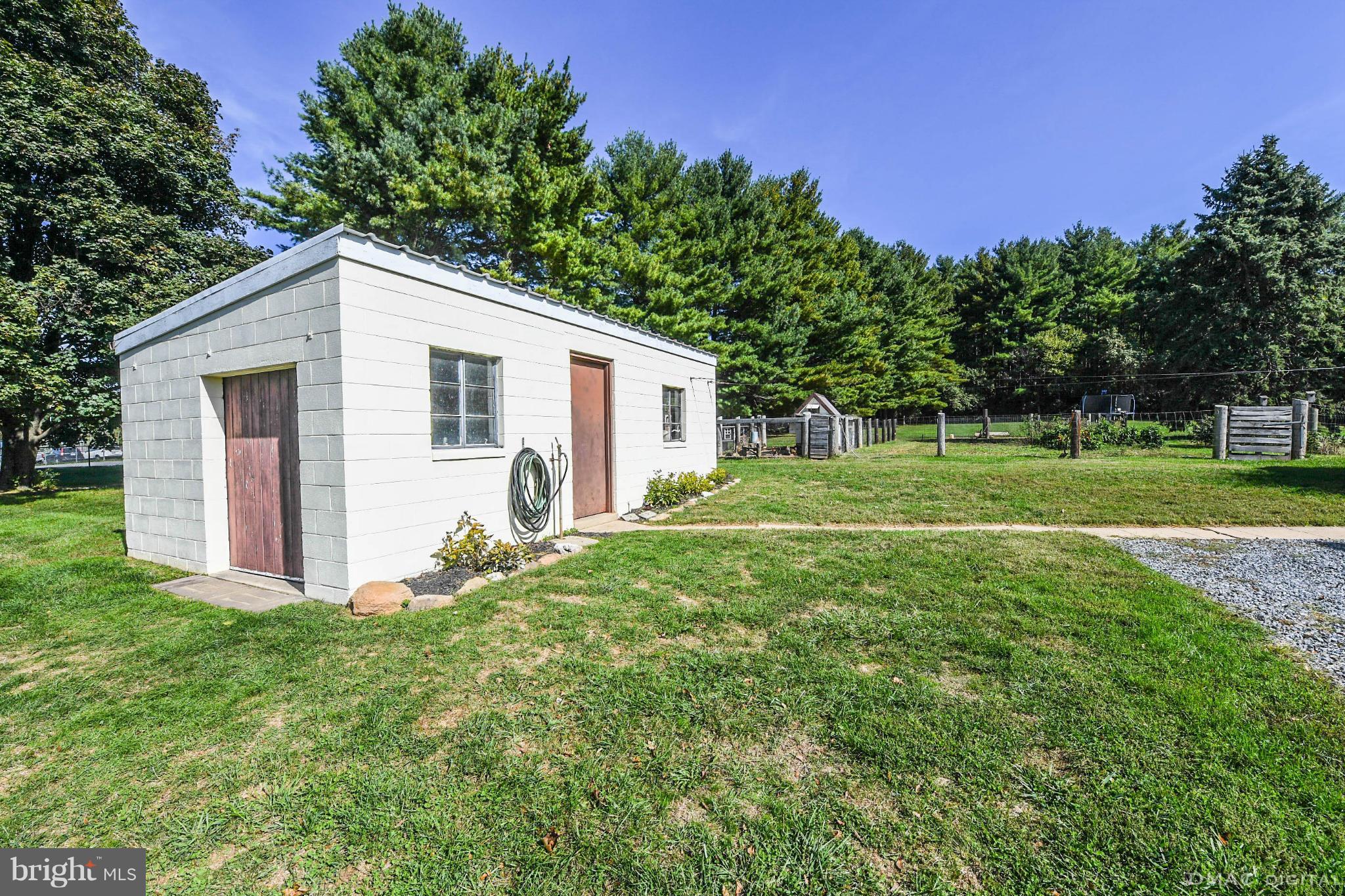 8701 Yellow Springs Road, Unit C Frederick, MD 21702 - Photo 25 of 30 a front view of house with yard and trees