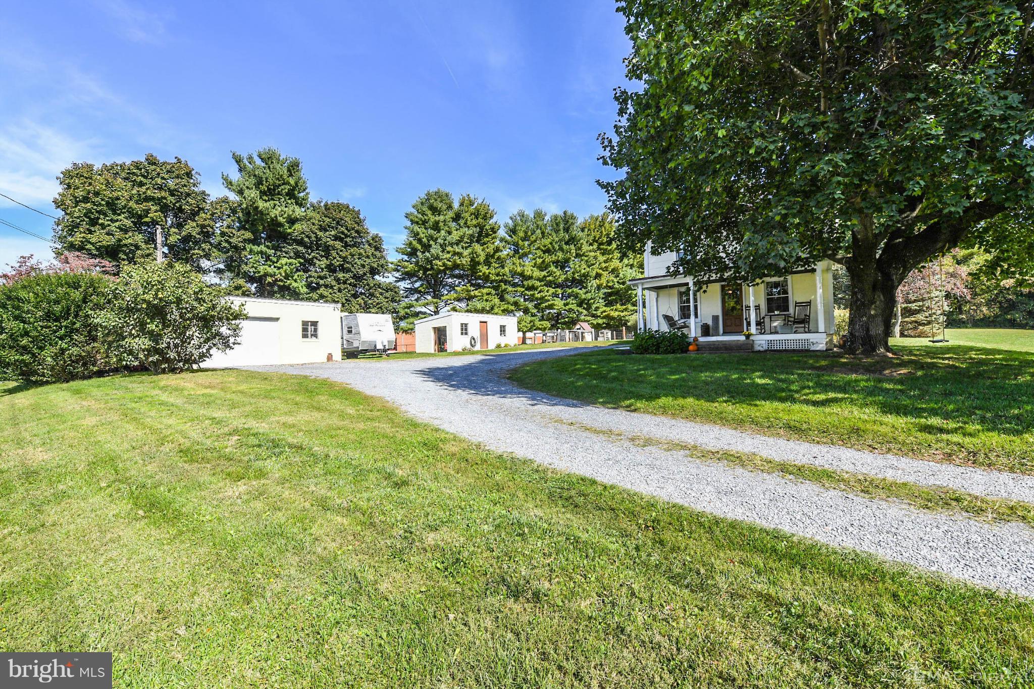 8701 Yellow Springs Road, Unit C Frederick, MD 21702 - Photo 29 of 30 a front view of a house with a yard