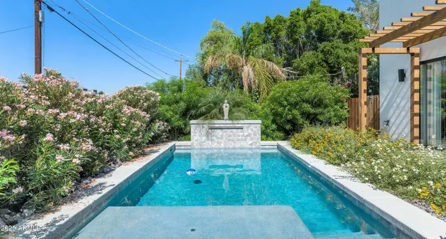 a view of balcony with a small yard