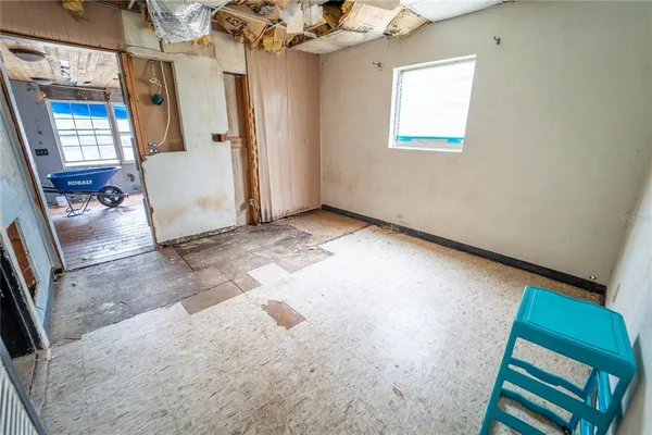 a living room with a furniture and a rug