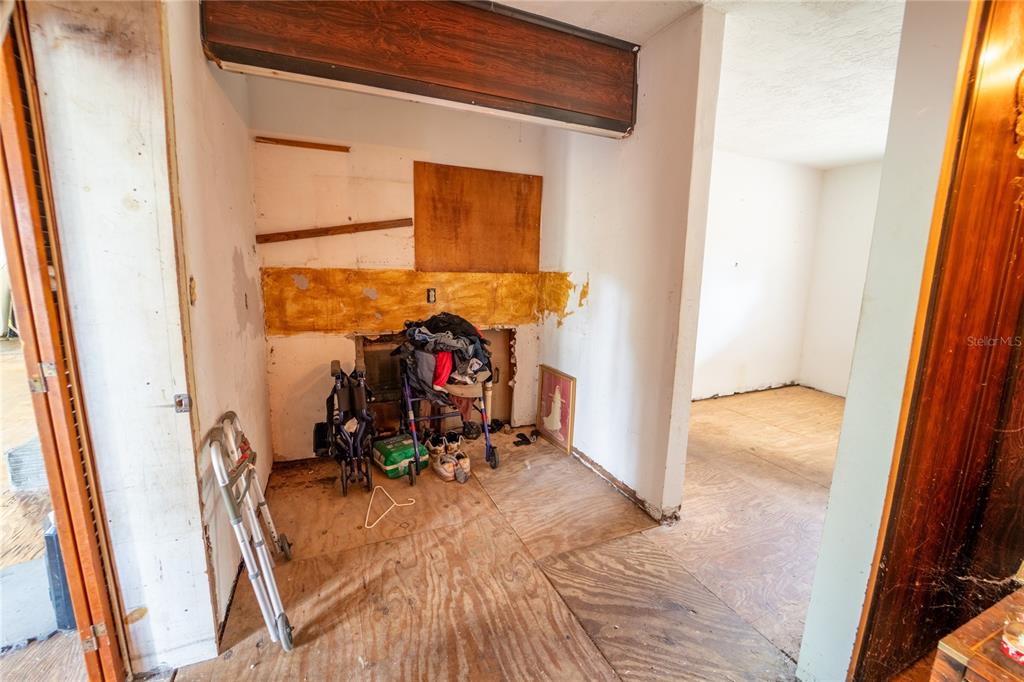 7813 Valrie Lane Riverview, FL 33569 - Photo 19 of 48 a view of a hallway with furniture and a window