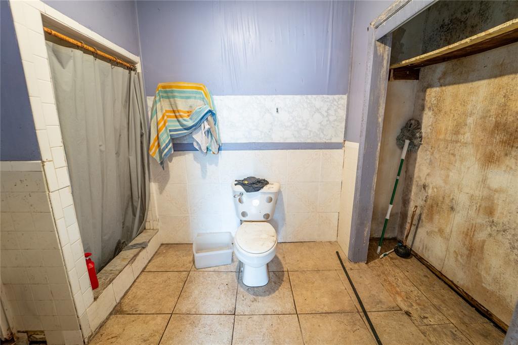 7813 Valrie Lane Riverview, FL 33569 - Photo 20 of 48 a bathroom with a sink and toilet