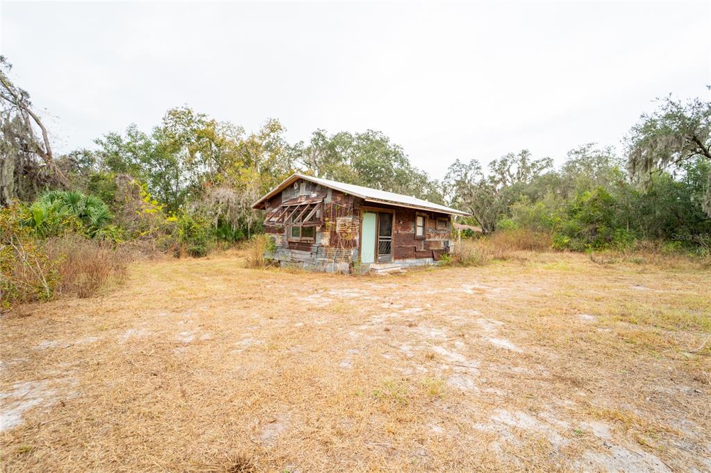 7813 Valrie Lane Riverview, FL 33569 - Photo 26 of 48 a house with trees in the background