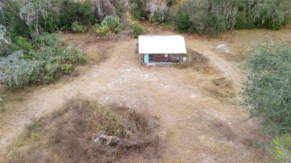 7813 Valrie Lane Riverview, FL 33569 - Photo 27 of 48 a view of a dry yard with trees