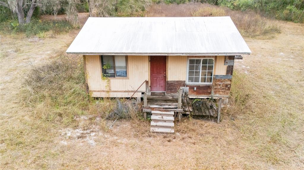 7813 Valrie Lane Riverview, FL 33569 - Photo 31 of 48 a aerial view of a house with table and chairs