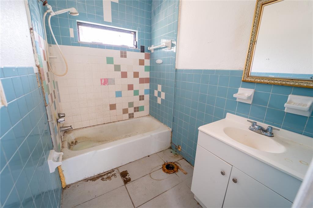 7813 Valrie Lane Riverview, FL 33569 - Photo 37 of 48 a bathroom with a sink a toilet and shower