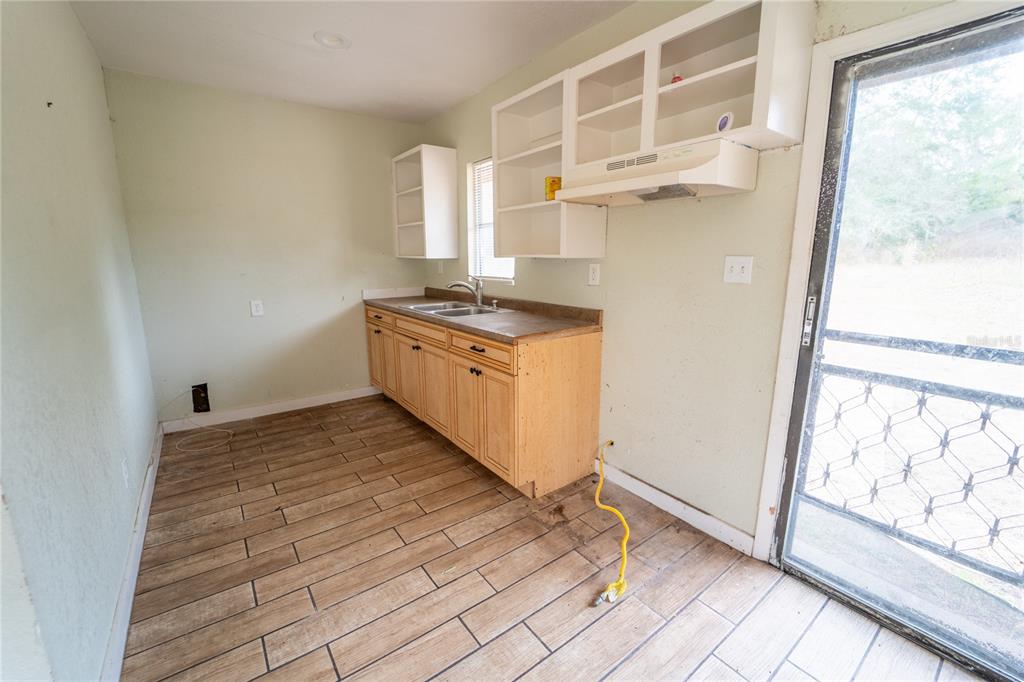 7813 Valrie Lane Riverview, FL 33569 - Photo 38 of 48 a kitchen with stainless steel appliances granite countertop a stove and a refrigerator