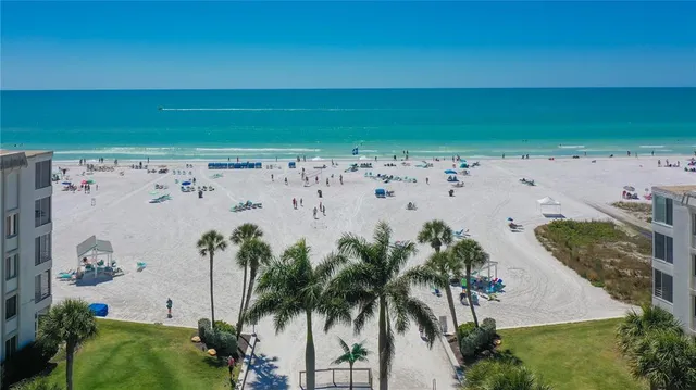 a view of an chairs and tables in the patio