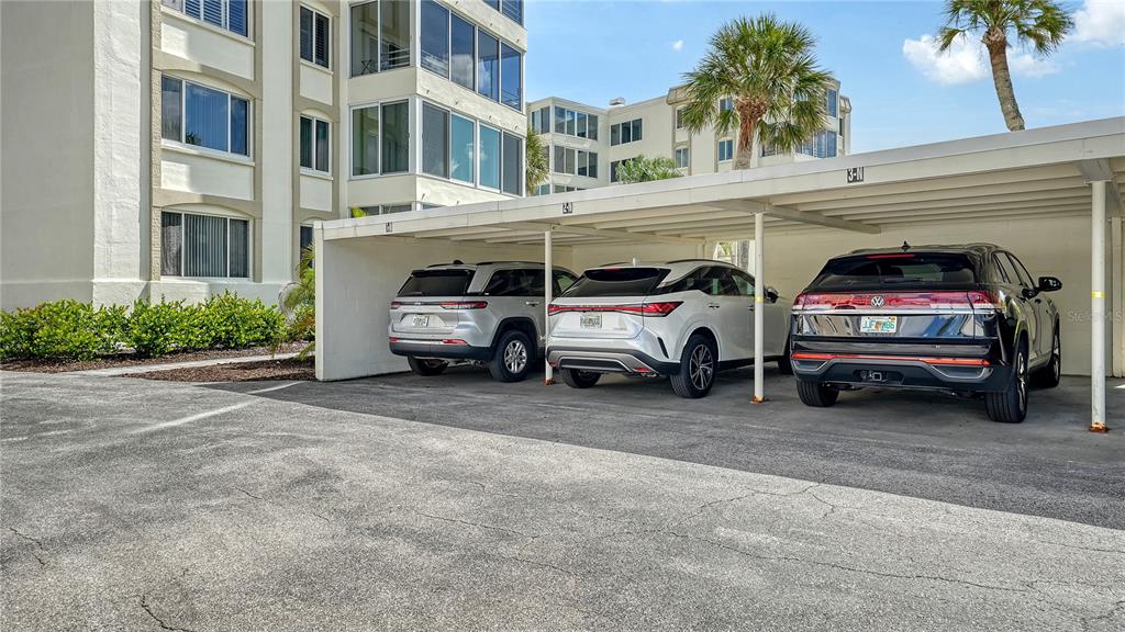 6144 Midnight Pass Road, Unit 2N Sarasota, FL 34242 - Photo 40 of 53 a view of a car garage