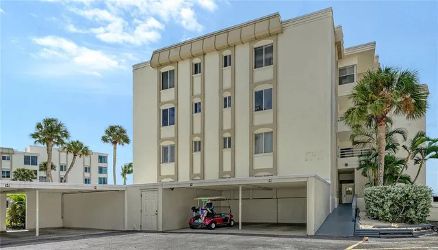 a view of a swimming pool with seating space