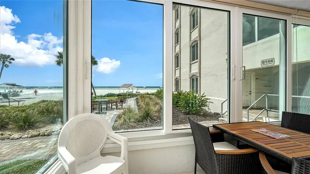 a view of balcony with patio