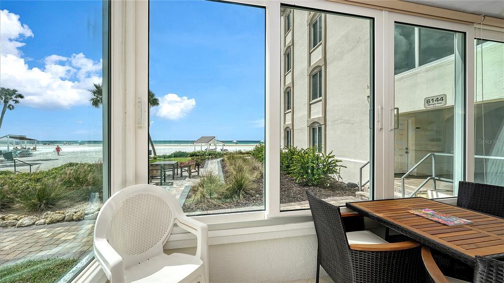 6144 Midnight Pass Road, Unit 2N Sarasota, FL 34242 - Photo 6 of 53 a view of balcony with patio