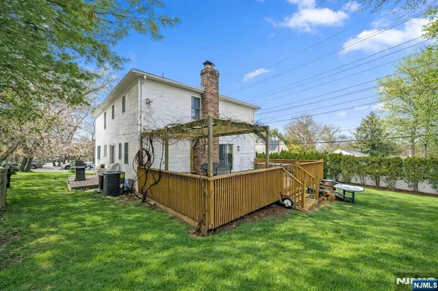 a view of a house with a big yard