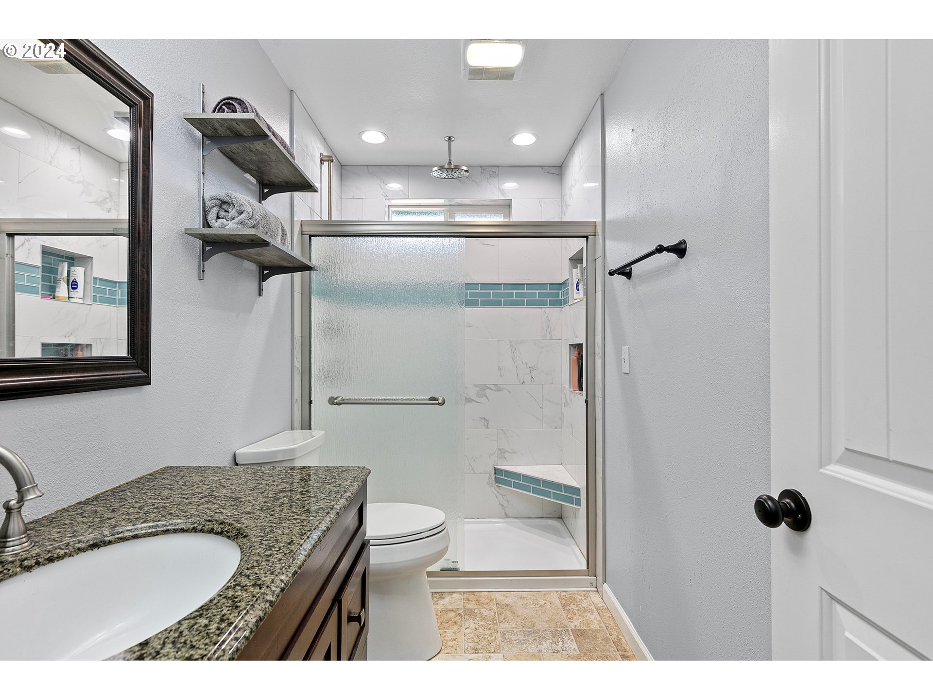 660 South 41st Place Springfield, OR 97478 - Photo 17 of 39 a bathroom with a granite countertop sink toilet and shower