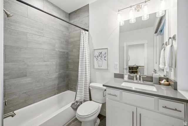 3355 Santa Fe Road Park City, UT 84098 - Photo 14 of 45 Bathroom featuring a white vanity with a gray countertop, an undermount sink, and a modern light fixture