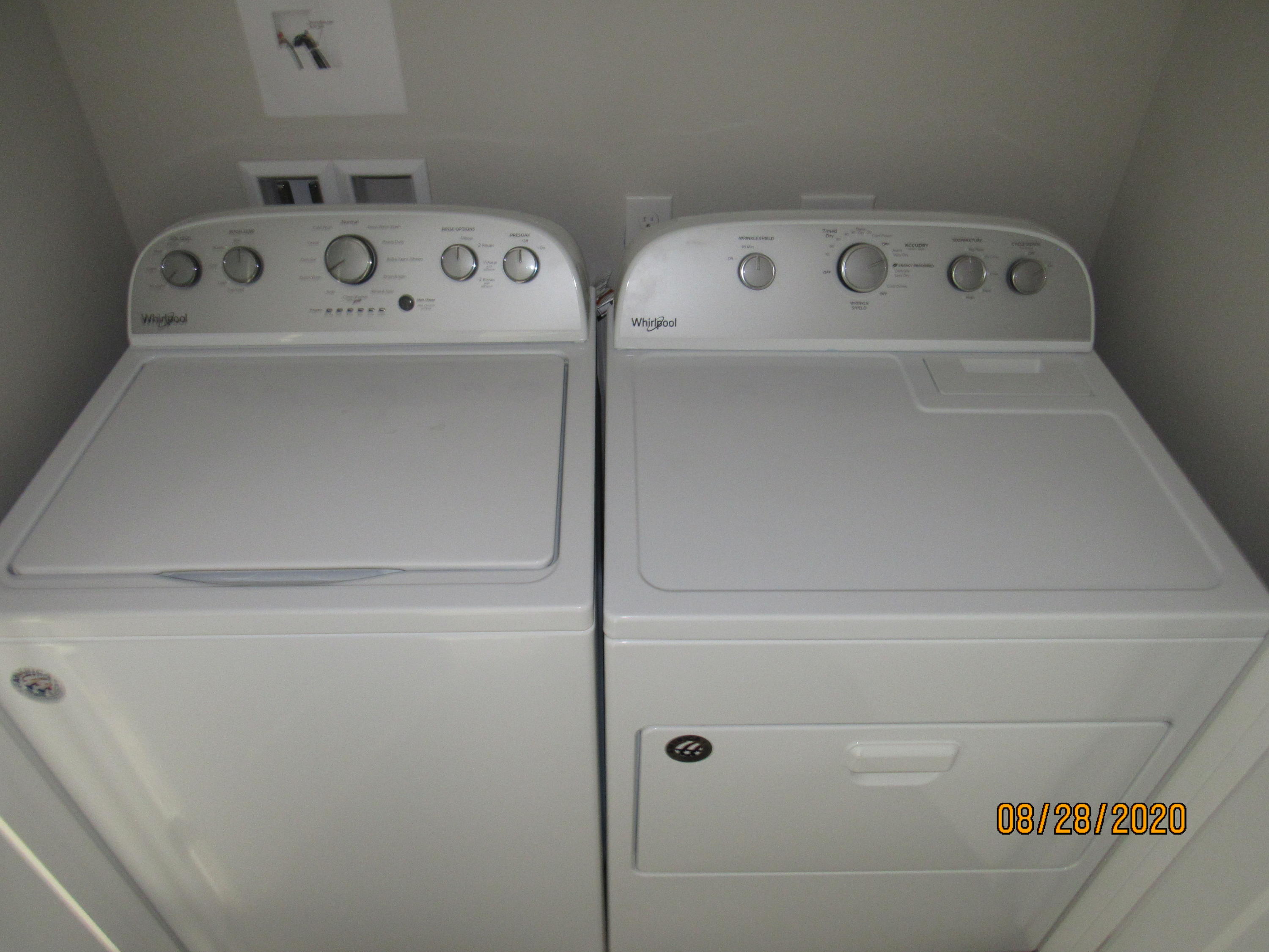 75 South Sand Palm Road Freeport, FL 32439 - Photo 12 of 18 a close view of a utility room with washer and dryer