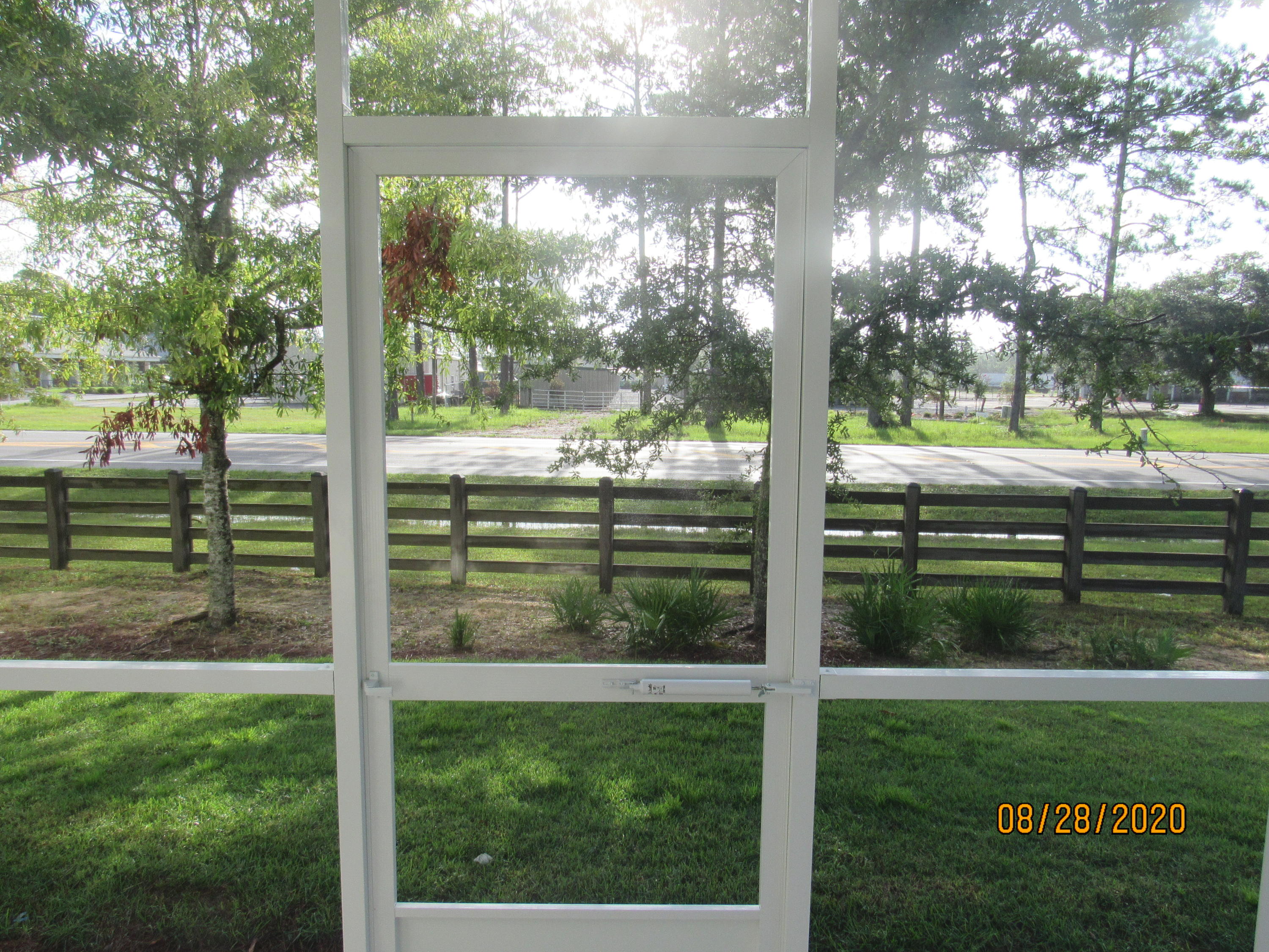 75 South Sand Palm Road Freeport, FL 32439 - Photo 8 of 18 a view of a room with a big yard