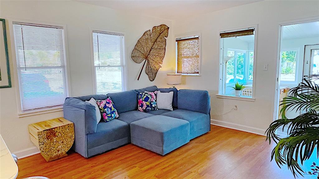 342 Southwest 2nd Avenue Dania Beach, FL 33004 - Photo 10 of 27 a living room with furniture and a window