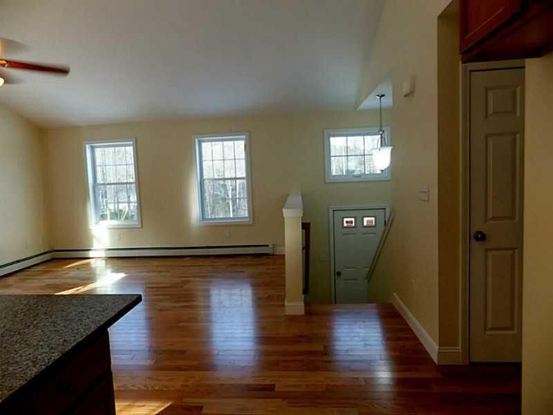 39 Delta Drive Windham, ME 04062 - Photo 9 of 22 Hardwood in the Open Concept Living Room