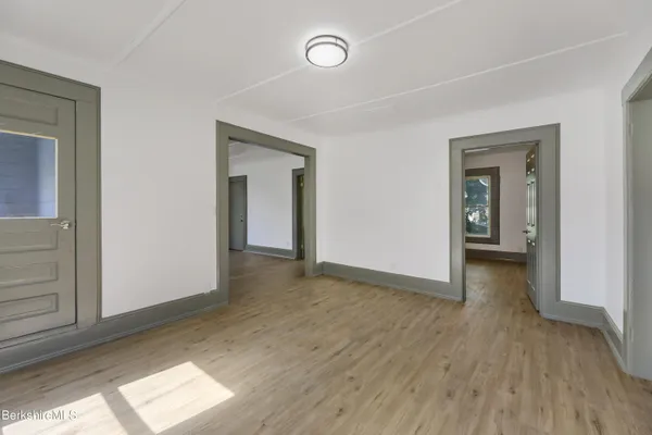 a kitchen with granite countertop a sink and a stove