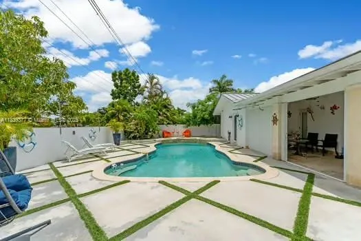 a view of yard with patio