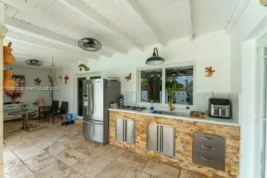 a large bathroom with a sink and mirror