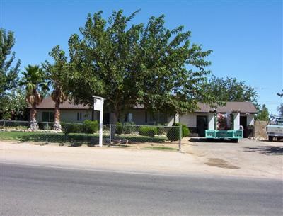 21082 Pahute Road Apple Valley, CA 92308 - Photo 1 of 1 front view of a house with a street