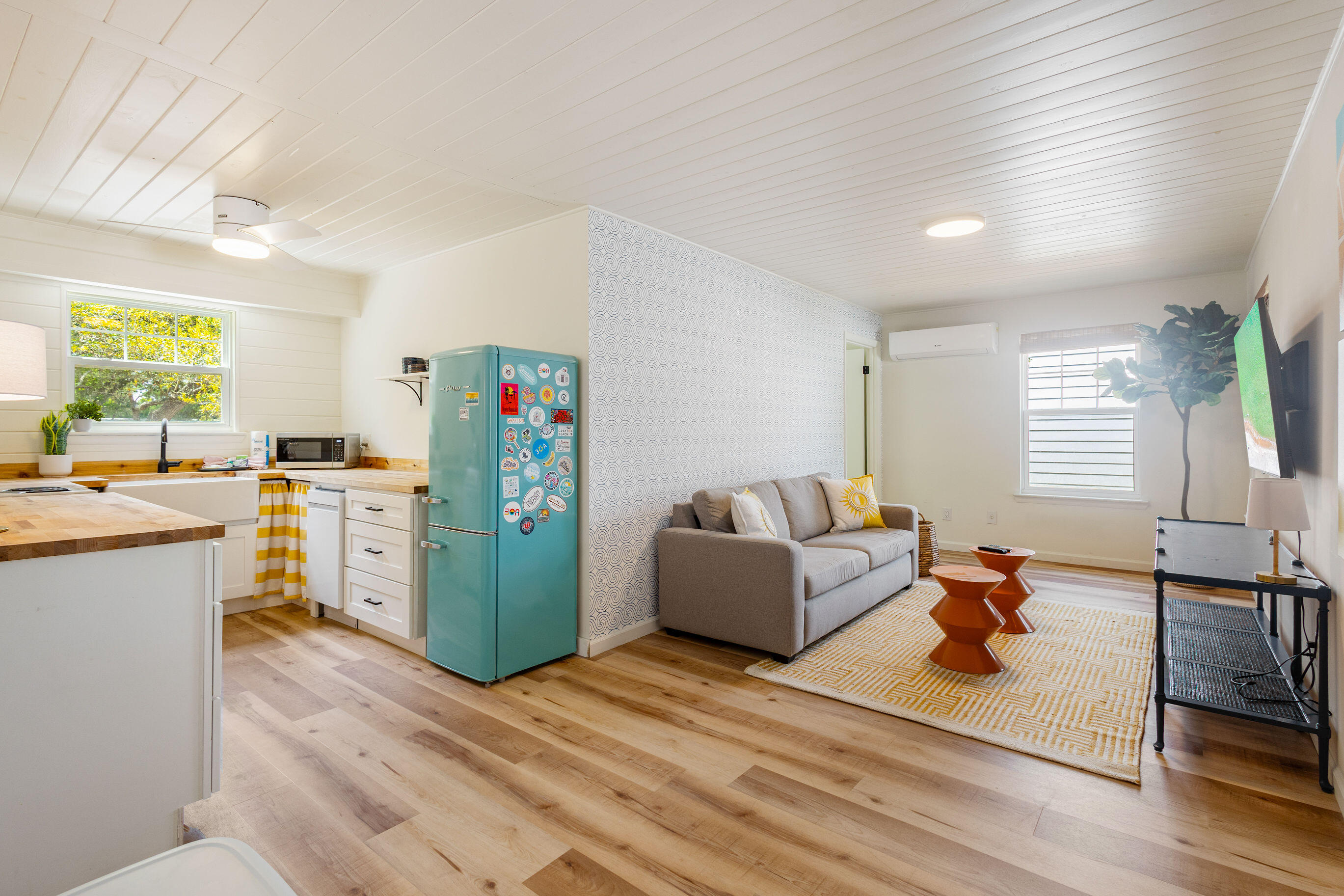 81 San Juan Avenue Santa Rosa Beach, FL 32459 - Photo 19 of 33 a living room with furniture and a open kitchen view