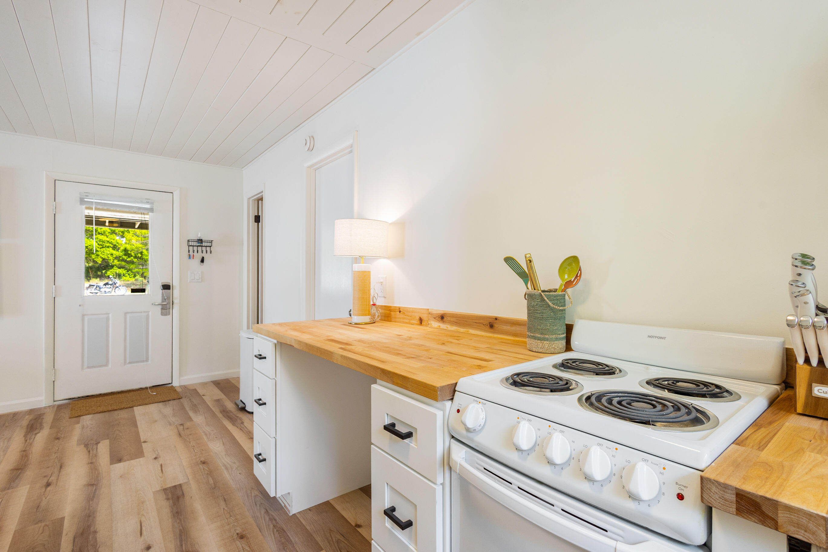 81 San Juan Avenue Santa Rosa Beach, FL 32459 - Photo 21 of 33 a kitchen with a stove and a sink