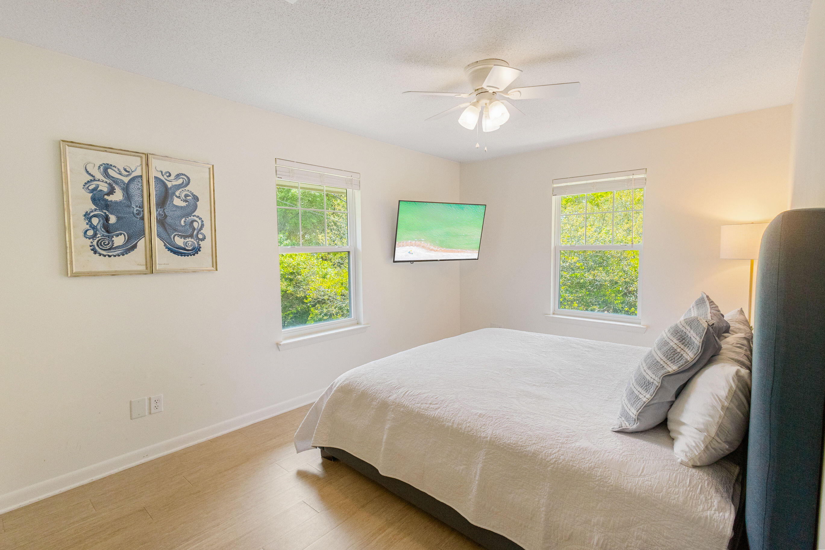 81 San Juan Avenue Santa Rosa Beach, FL 32459 - Photo 27 of 33 a bedroom with a bed and a window