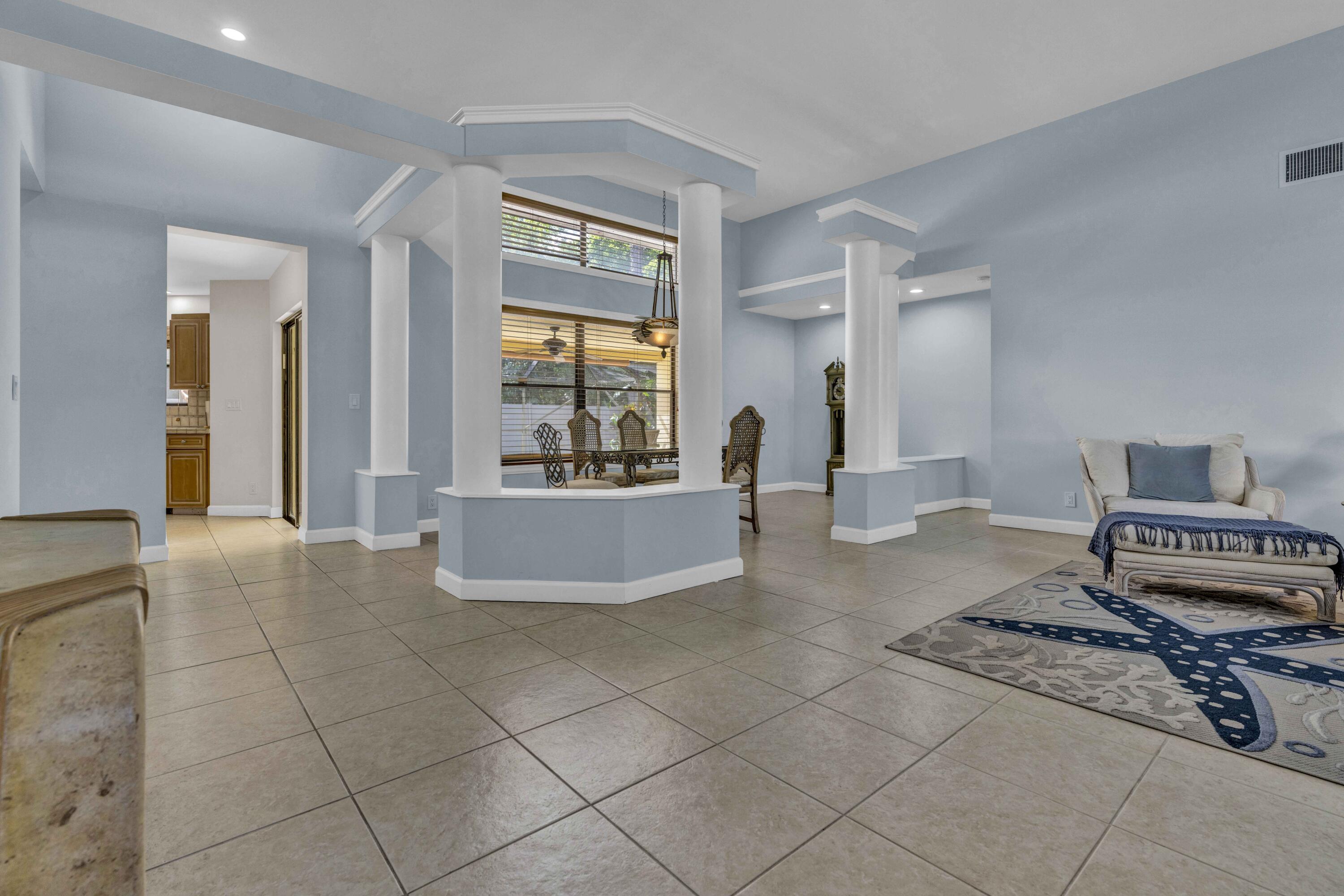 22323 Martella Avenue Boca Raton, FL 33433 - Photo 3 of 21 a view of a living room and kitchen