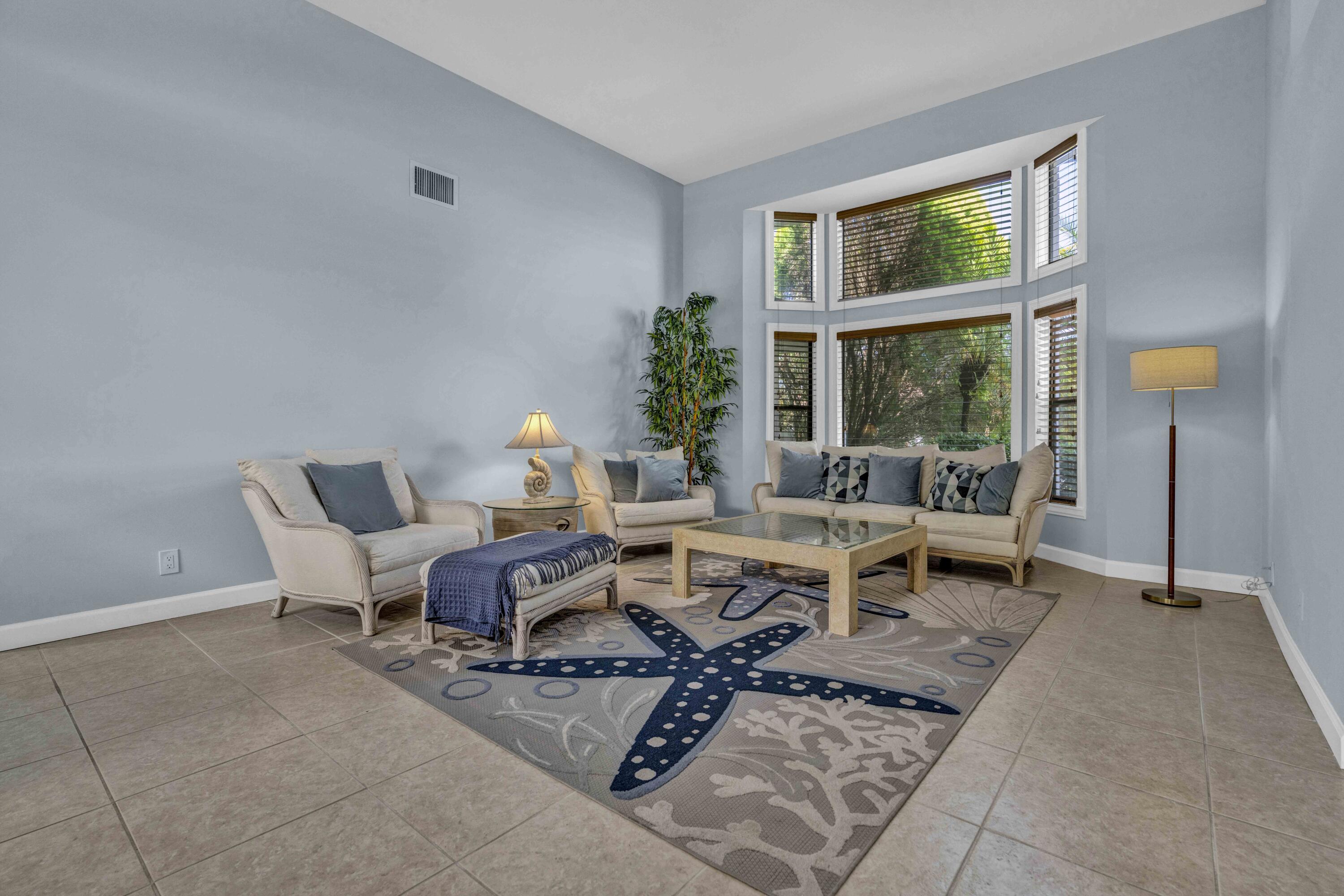 22323 Martella Avenue Boca Raton, FL 33433 - Photo 4 of 21 a living room with furniture and a window