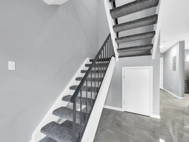 a view of entryway with wooden floor