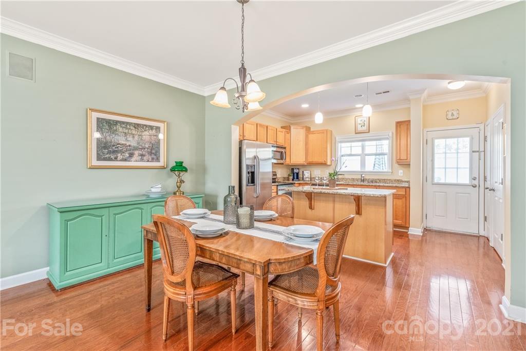 833 Millbrook Road, Unit 833 Charlotte, NC 28211 - Photo 1 of 23 a dining room with furniture and window