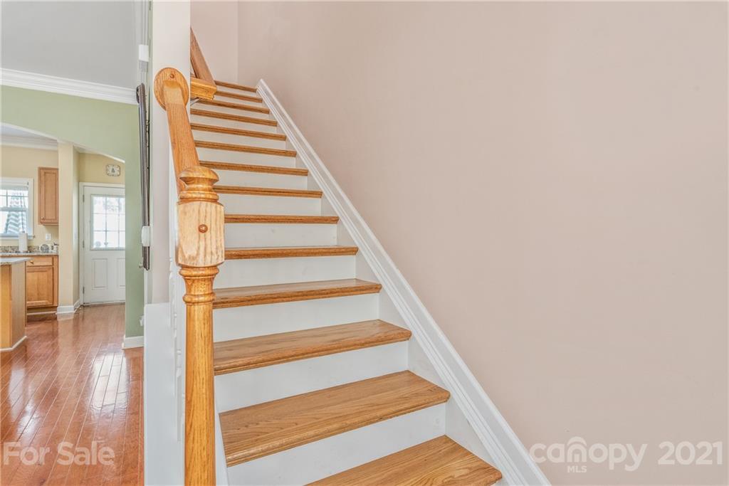 833 Millbrook Road, Unit 833 Charlotte, NC 28211 - Photo 13 of 23 a view of entryway and hall with wooden floor
