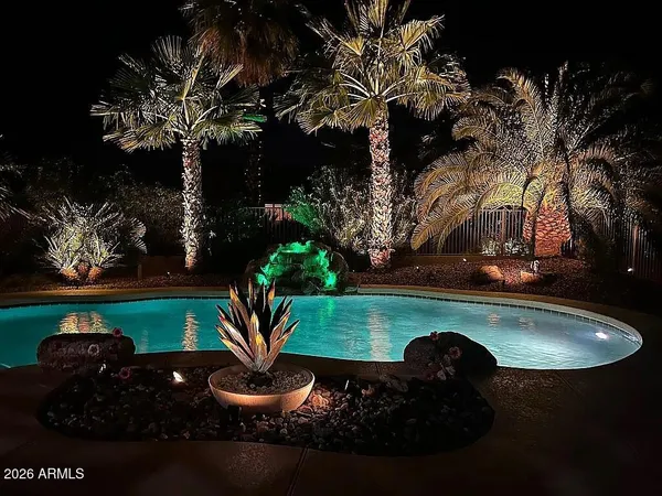 a table with some potted plants and trees