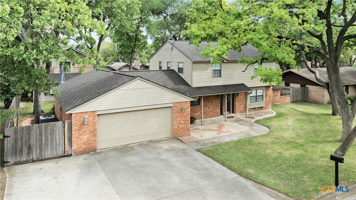 1903 North Harding Avenue Cameron, TX 76520 - Photo 39 of 44 a front view of a house with garden