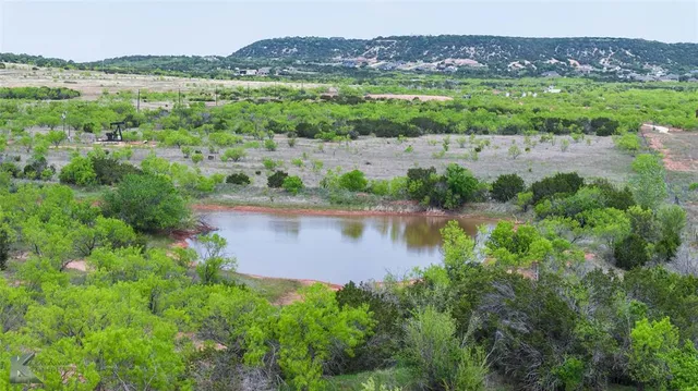 a view of lake with mountain