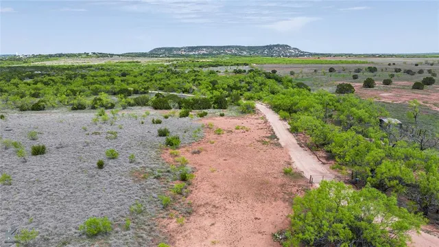 a view of a lake with a city