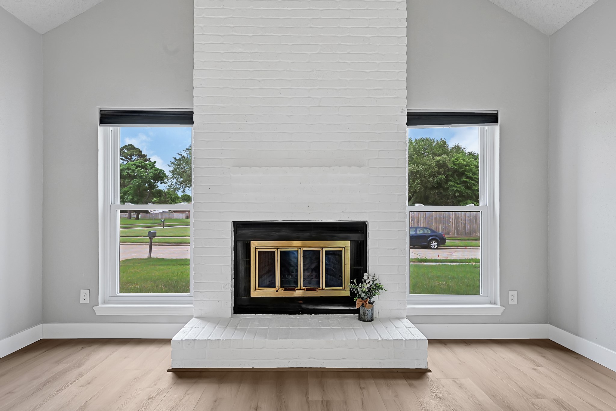 21211 Slippery Creek Lane Spring, TX 77388 - Photo 11 of 29 a living room with a fireplace and a large window