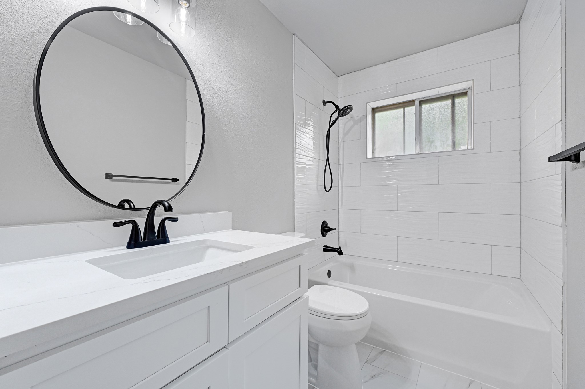 21211 Slippery Creek Lane Spring, TX 77388 - Photo 19 of 29 a bathroom with a sink a toilet and a mirror