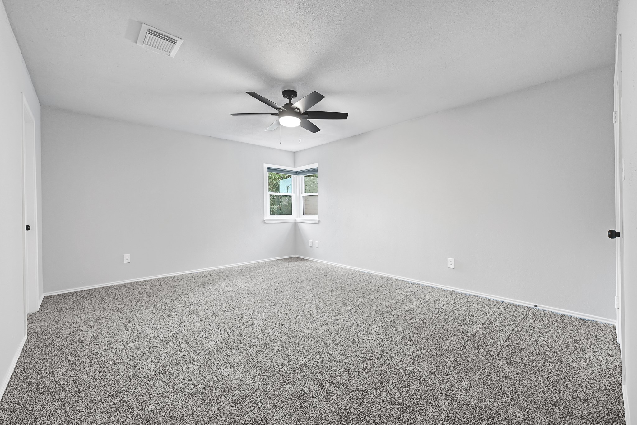 21211 Slippery Creek Lane Spring, TX 77388 - Photo 21 of 29 a view of an empty room with a window