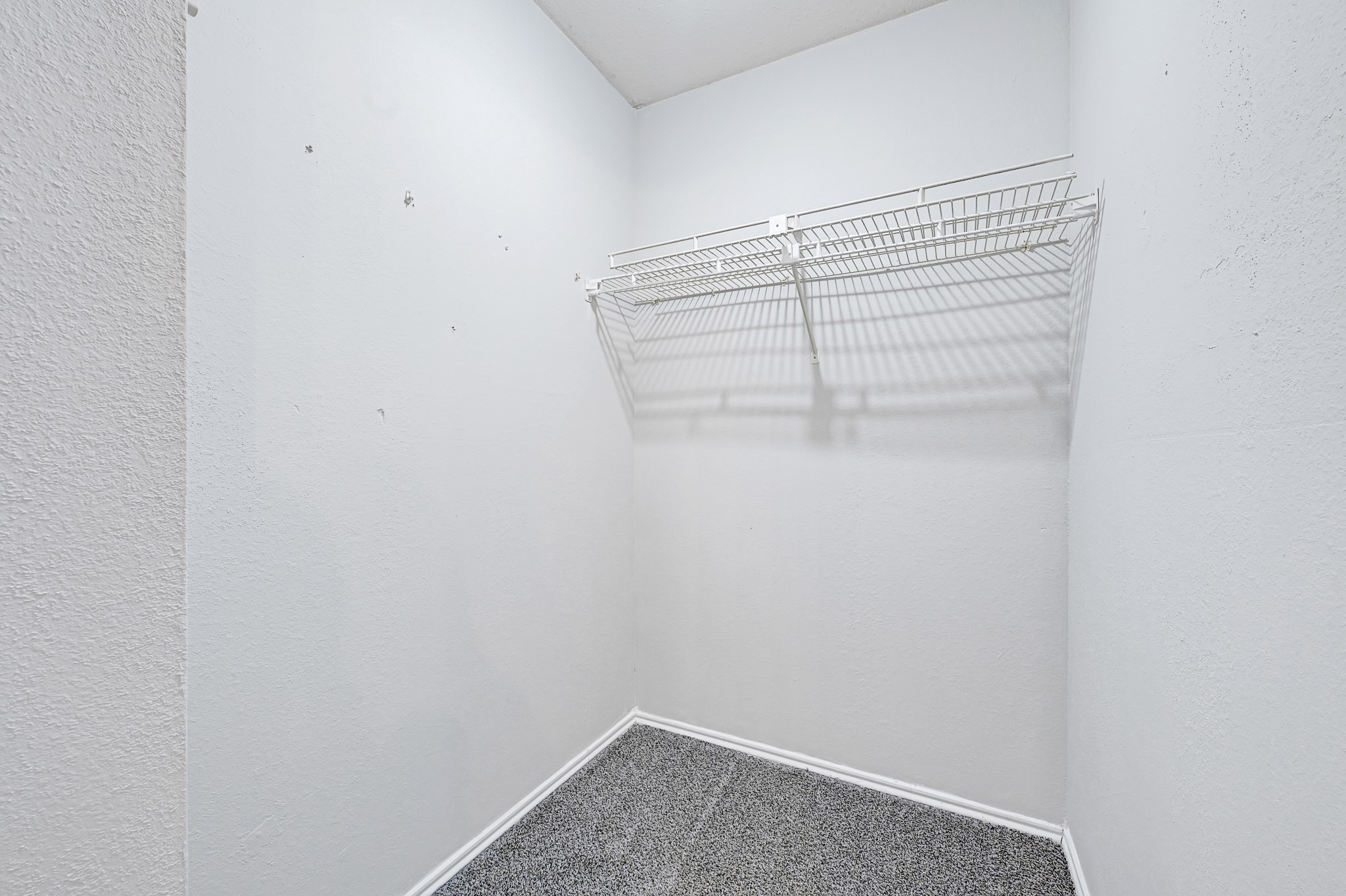 21211 Slippery Creek Lane Spring, TX 77388 - Photo 25 of 29 a view of a room with racks on the wall