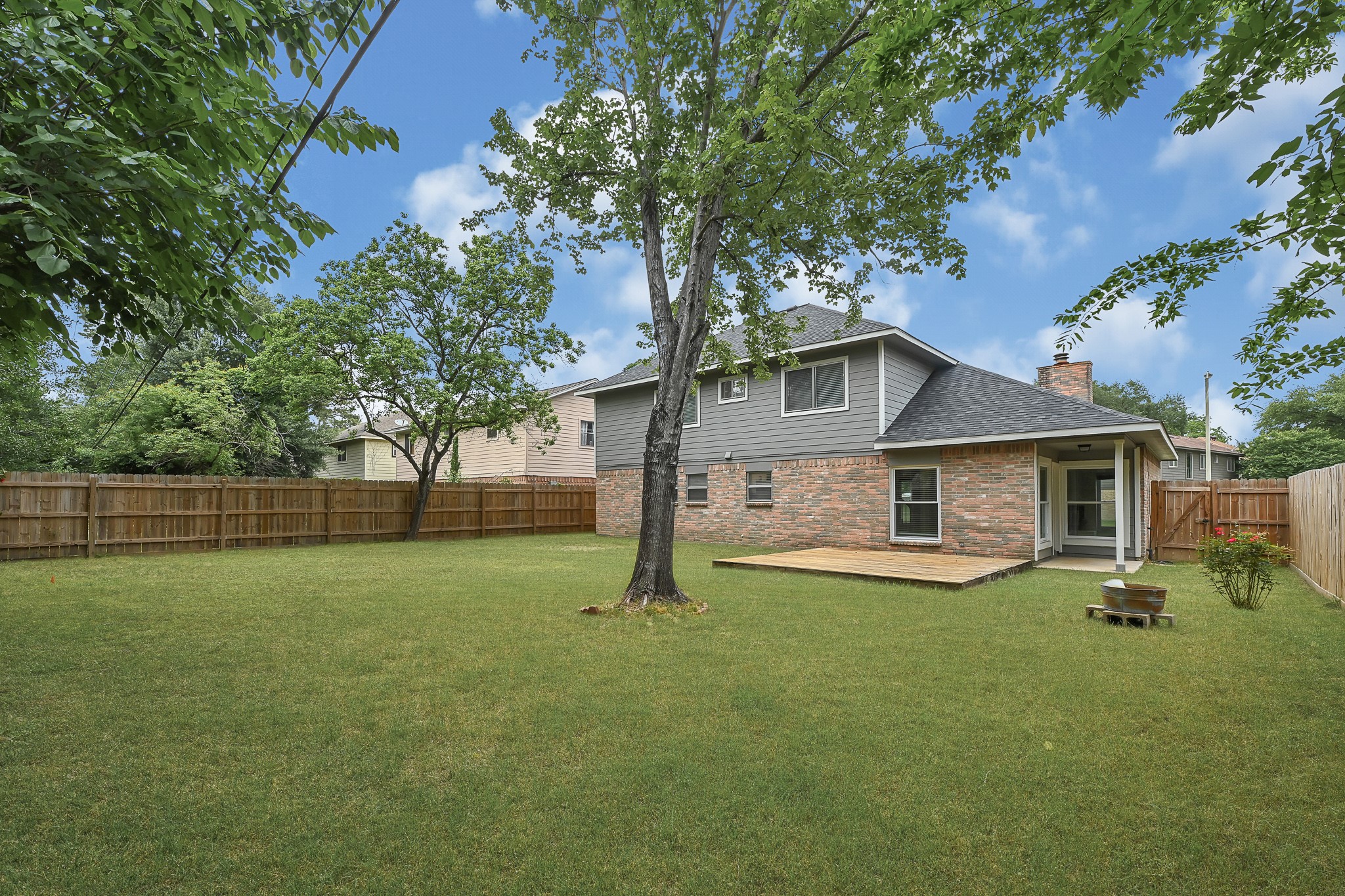 21211 Slippery Creek Lane Spring, TX 77388 - Photo 28 of 29 a front view of house with yard and green space