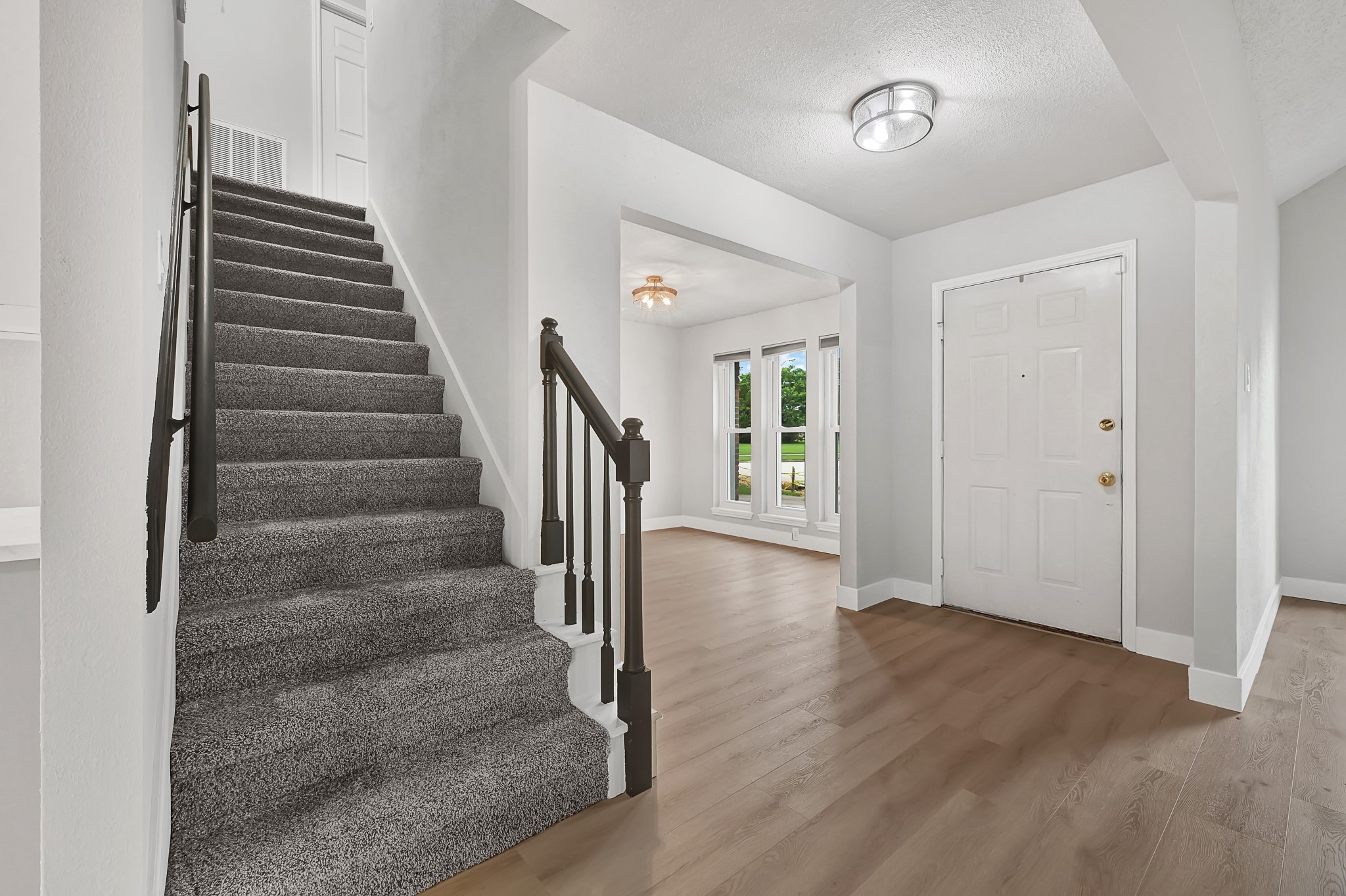 21211 Slippery Creek Lane Spring, TX 77388 - Photo 6 of 29 a view of an entryway with wooden floor